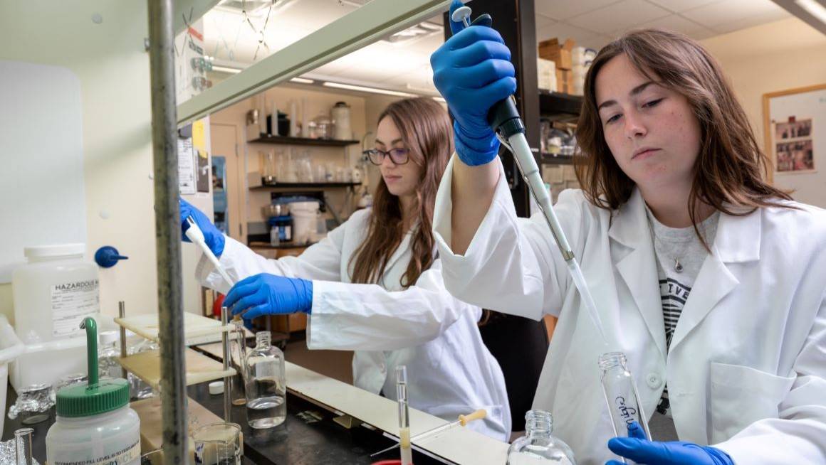 Students conduct research in one of Bryant's laboratories. 