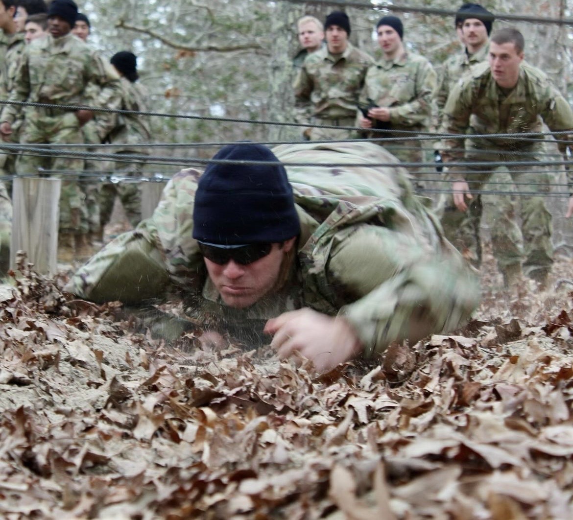 Cadets test their agility on the obstacle course during joint field training exercises.
