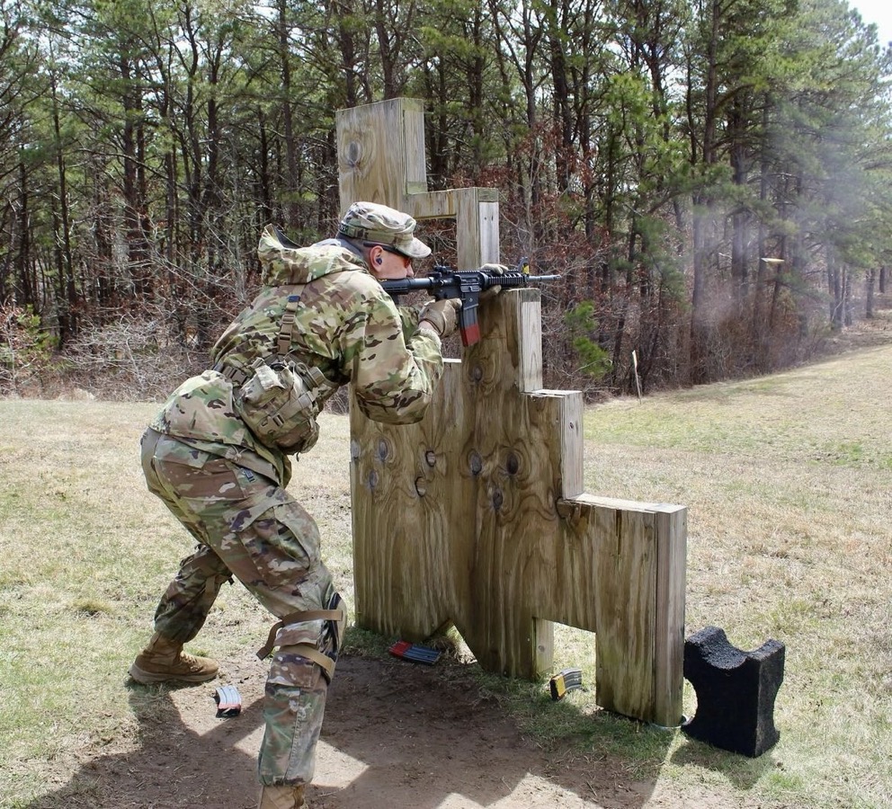 A cadet fires his rifle during joint field training exercises.