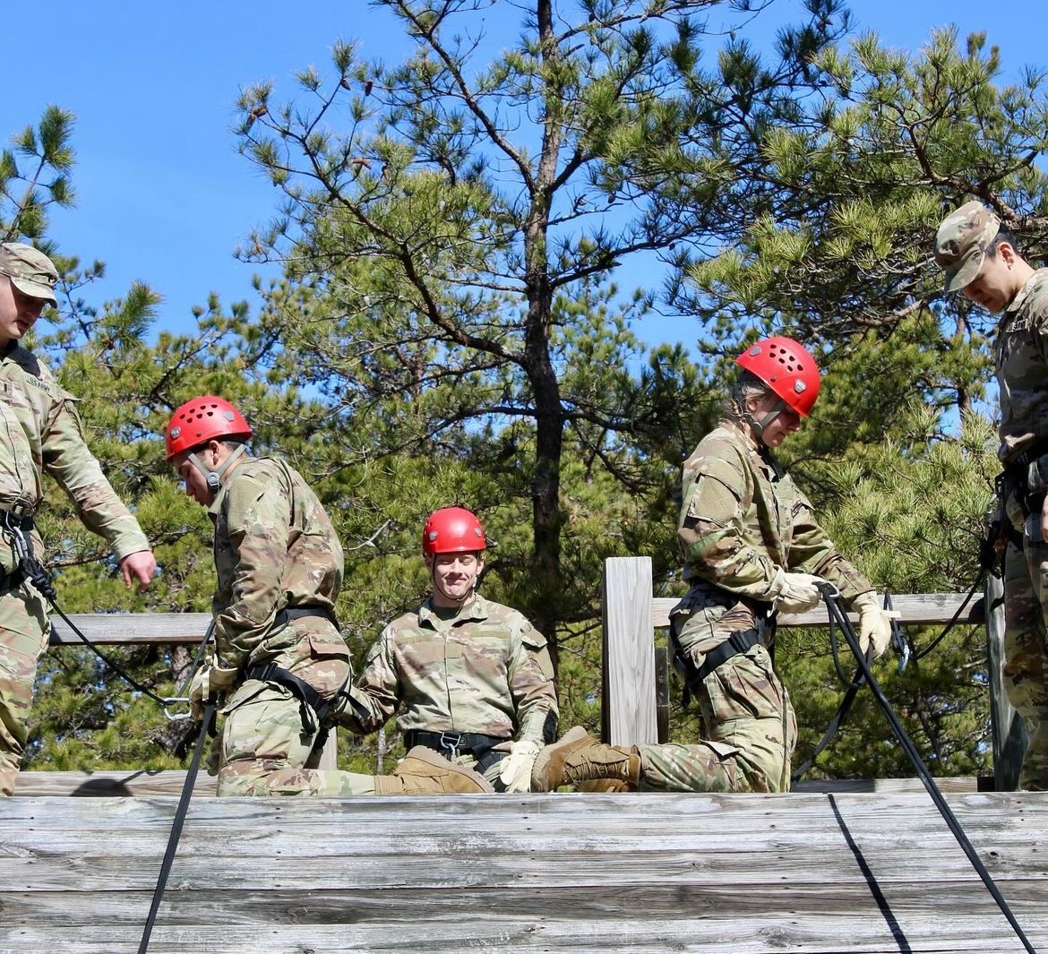 Cadets work on slant wall repelling during joint field training exercises.