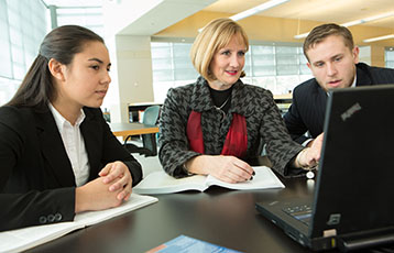 Bryant Professor Lori Coakley sits down with two students