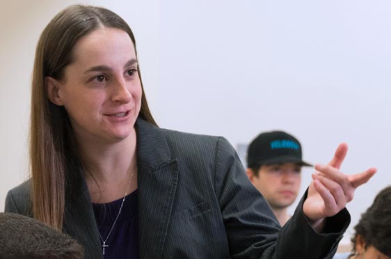 Bryant University Professor Laura Beaudin teaches in a classroom.