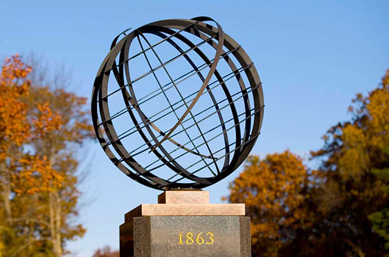 The entrance globe at Bryant University.