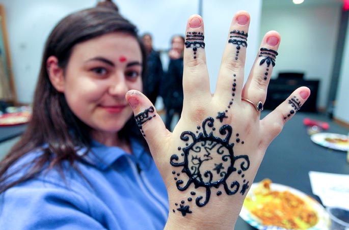 A Bryant student shows off her henna tattoo.