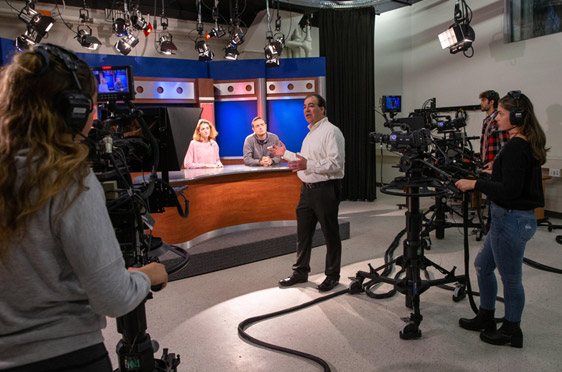 Bryant Professor Zammarelli teaches in the on-campus TV production studio