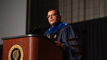 Bryant University Provost Rupendra Paliwal delivers an address at Convocation.