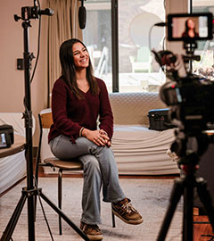 Ritvi Sigh '25, the subject of a new documentary on women in finance, films a shot in her dorm room.